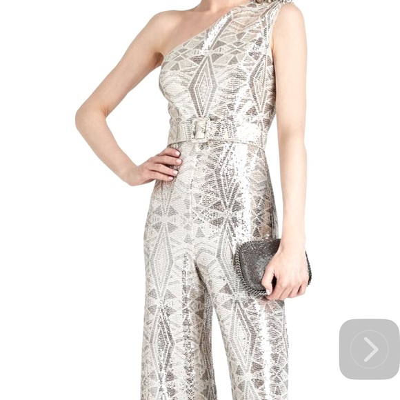 Badgley Mischka Silver Sequin one Shoulder belted Jumpsuit. Size 4